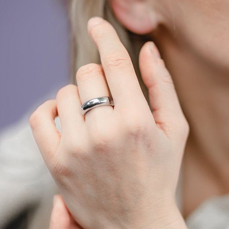 "Handcrafted minimalist silver earrings by Maarja Palu, featuring ethically sourced materials, available at Sostter."