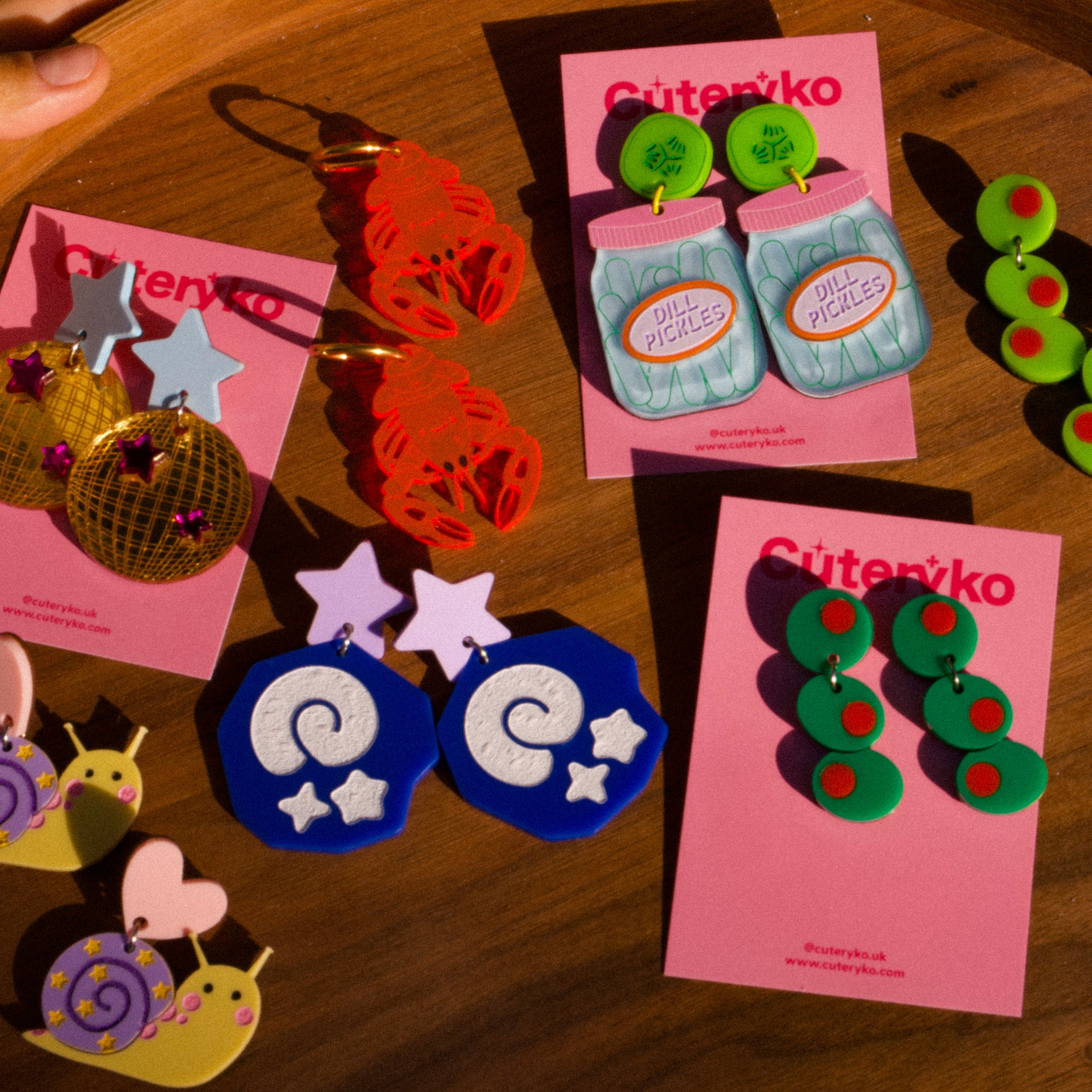 Discover Cuteryko — handmade statement earrings and accessories by founder Chloe, Belfast. Upcycled toys, Irish culture and 300K+ fans. Jewellery that makes people stop and ask.