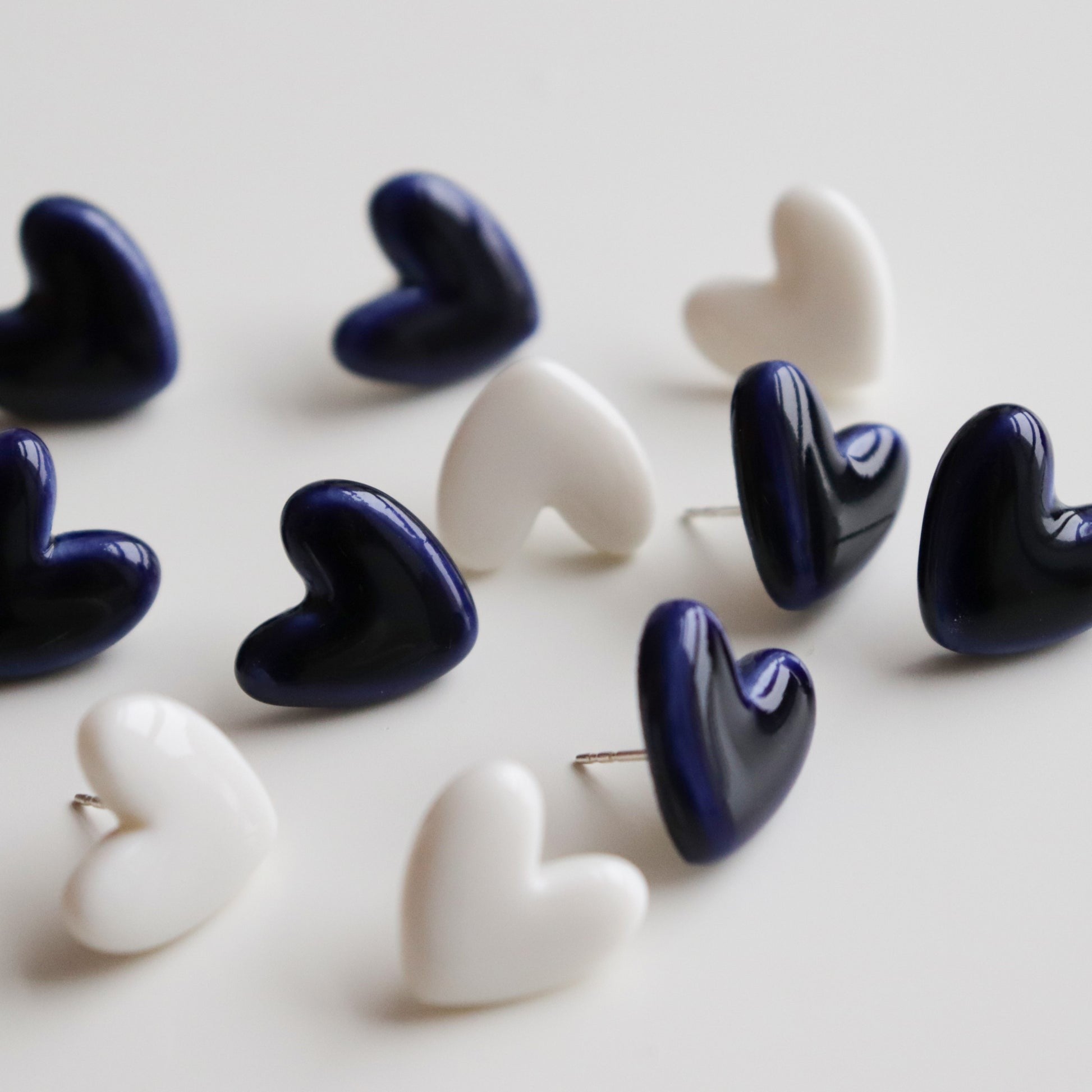 Rozenthal handmade porcelain jewellery with gold luster - ceramic earrings and necklaces by designer Madara Rozentāle in Riga Latvia at Sostter