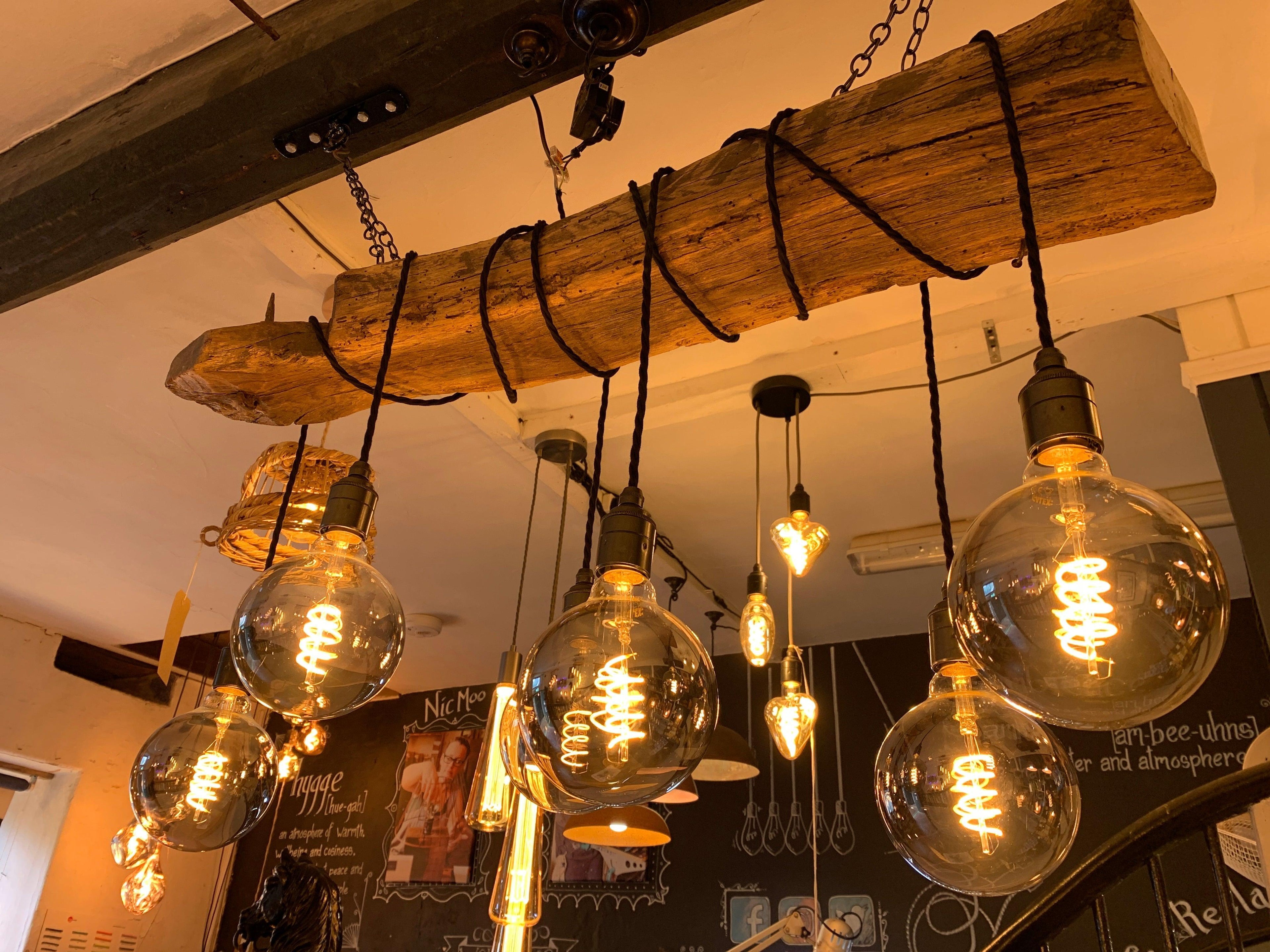 MooBoo Home reclaimed timber chandeliers, floor lamps and clocks — hand-built one-of-one homeware from Devon at Sostter