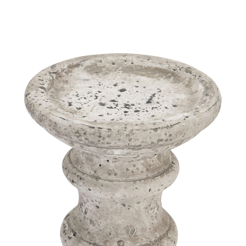 Stone ceramic column candle holder with Greco-Roman architectural details in neutral matte finish by RoomLondon at brixbailey.com