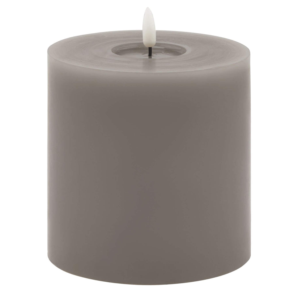 Grey melt-effect LED wax candle with realistic dripping texture and warm flameless glow for ambient lighting by sostter at brixbailey.com