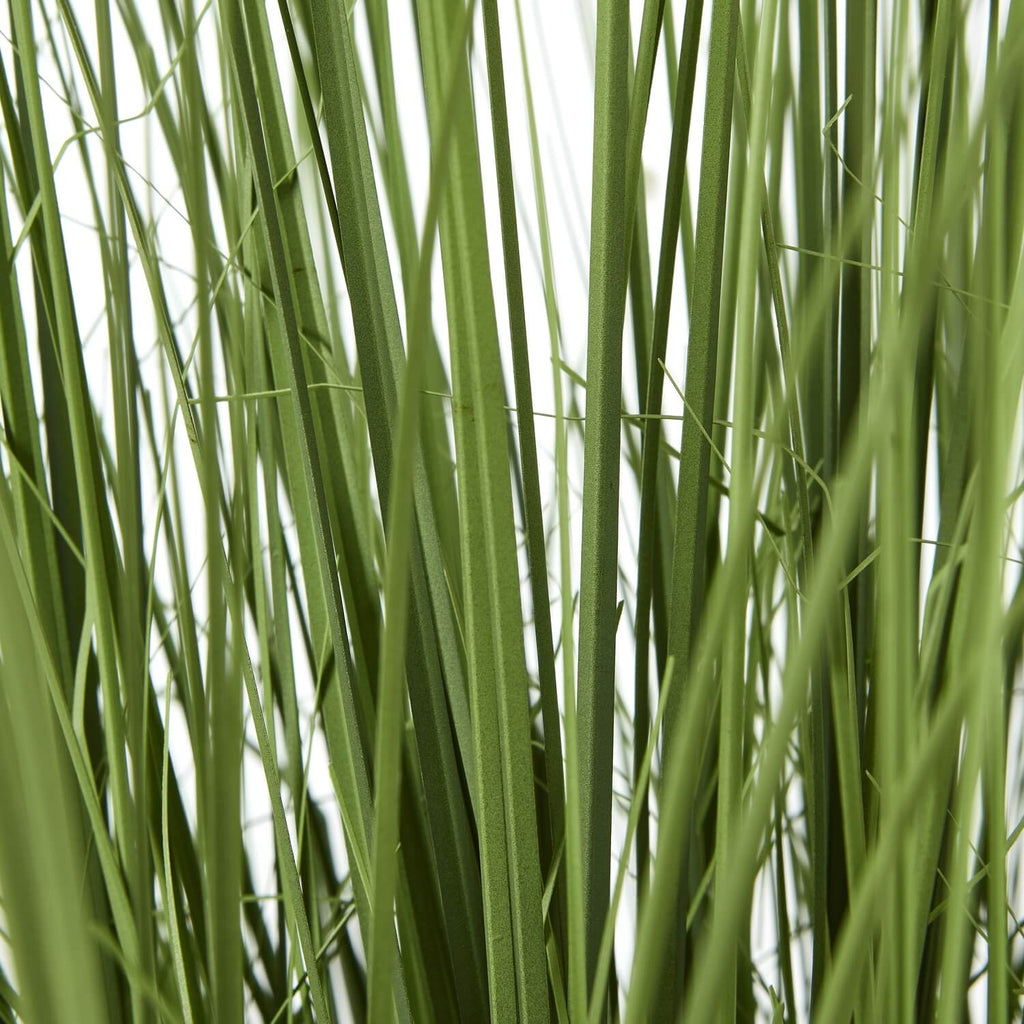 Large artificial onion grass plant in sleek black pot, 90cm tall with realistic green blades and natural-looking stems. by sostter at brixbailey.com
