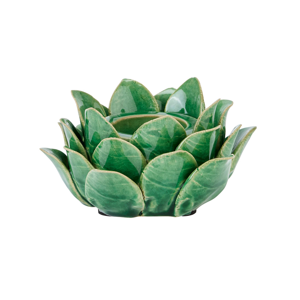 Handcrafted ceramic tea light holder with artichoke cutouts in rich green glaze, casting intricate shadow patterns. by RoomLondon at brixbailey.com