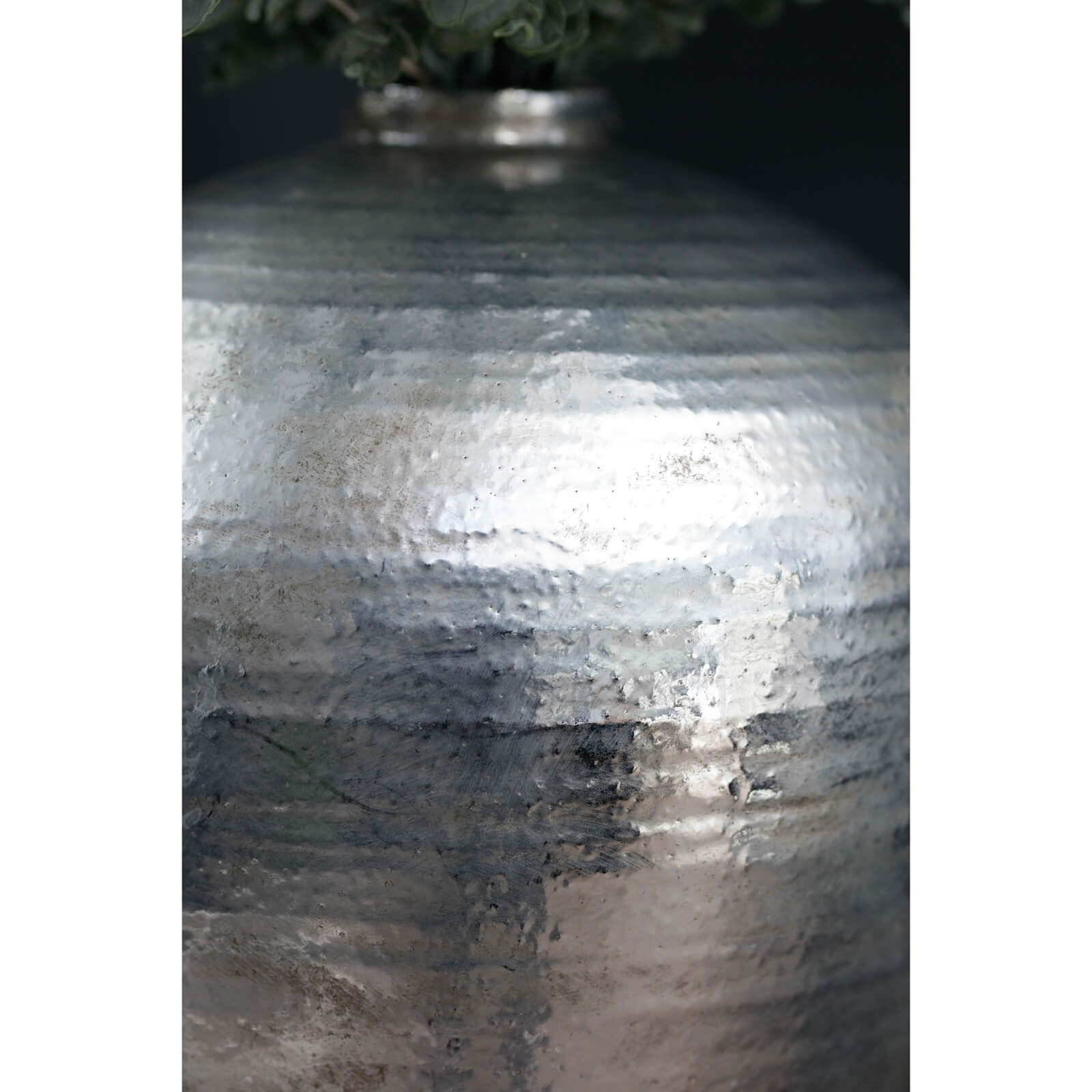 Hand-hammered silver ceramic vase with reflective metallic finish, modern home decor statement piece by sostter at brixbailey.com
