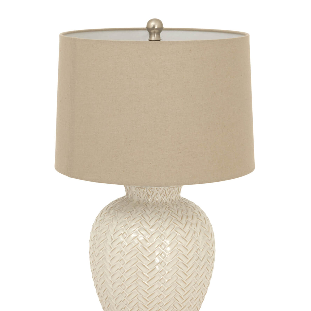 Handcrafted white ceramic table lamp with twill weave texture and linen shade for warm ambient lighting by sostter at brixbailey.com