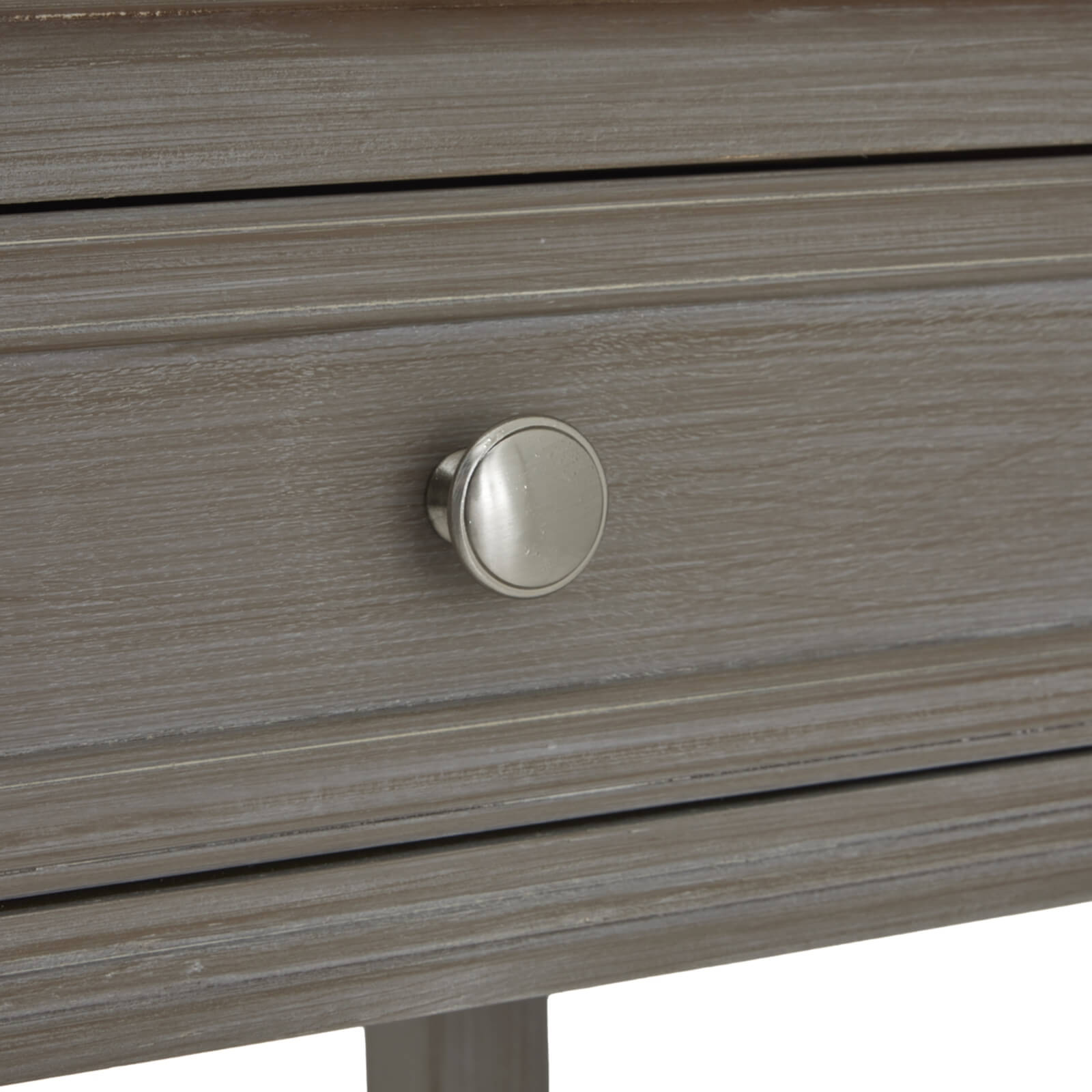 Distressed grey four-drawer console table with solid wood construction and transitional design for living room storage. by Sostter at brixbailey.com