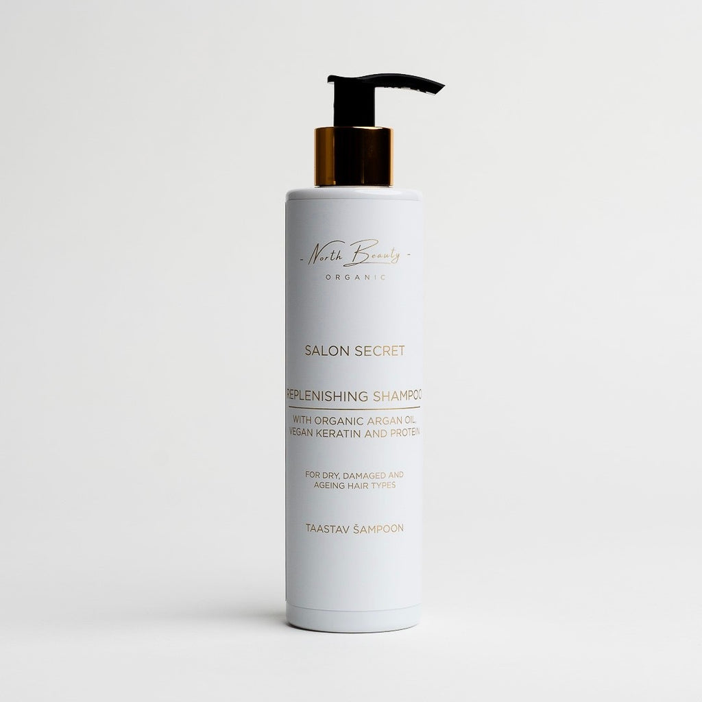 a soft-focused close-up of our vegan keratin conditioner-mask, its creamy texture glowing in warm morning light