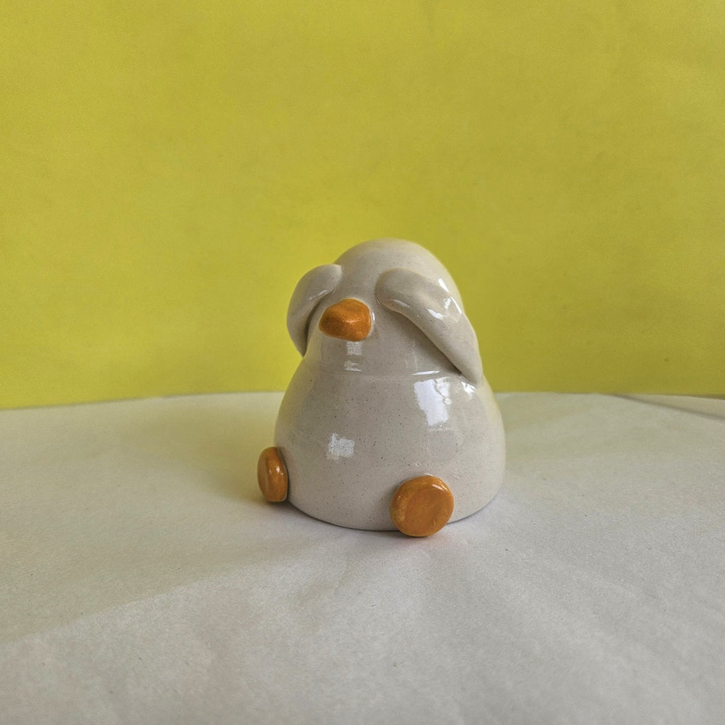 Shy Duck Hiding Ceramic Ornament