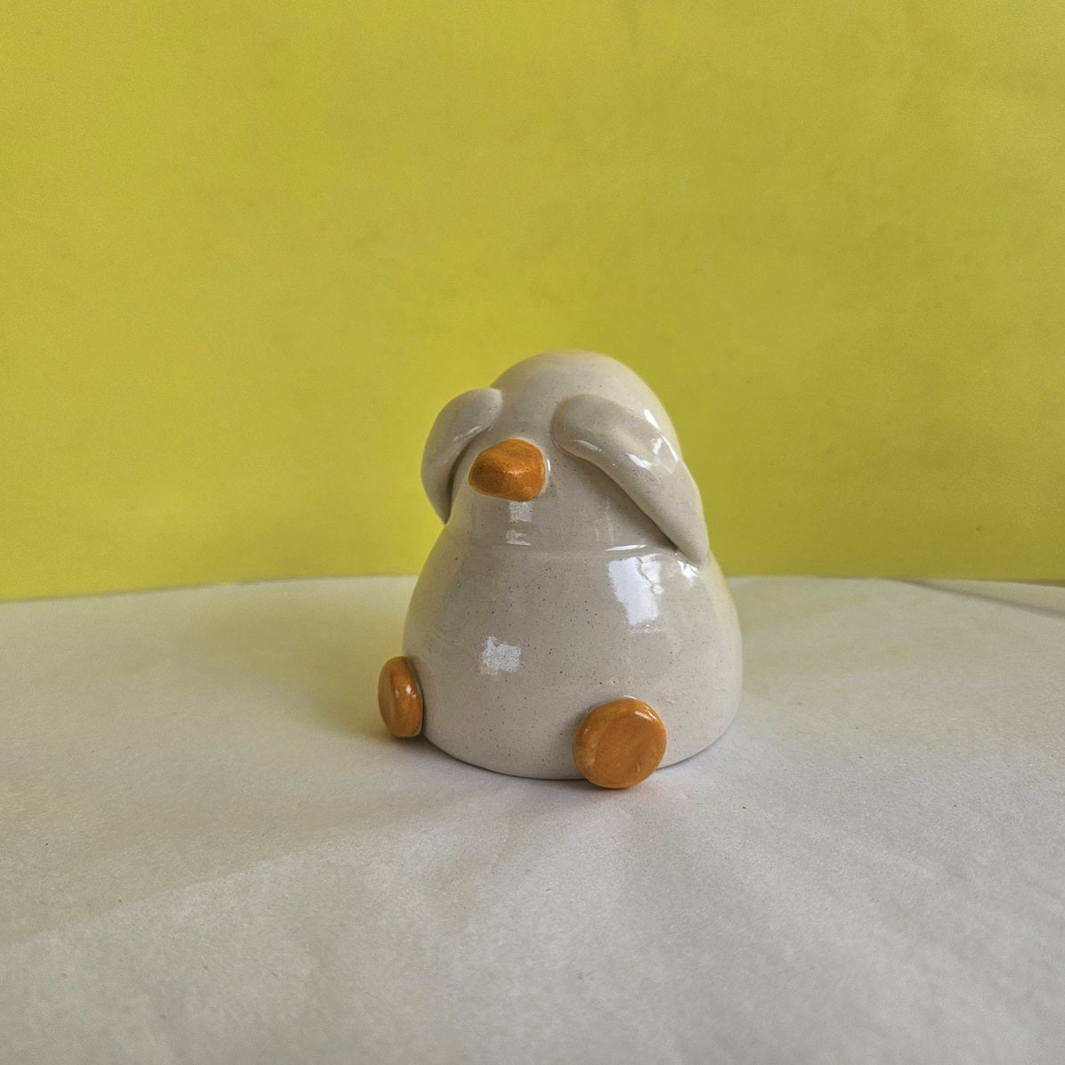 Shy Duck Hiding Ceramic Ornament