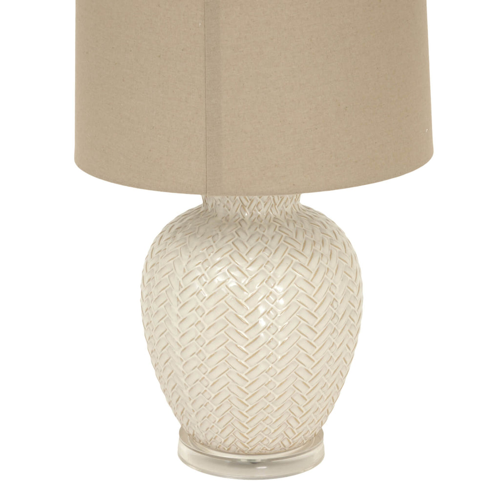 Handcrafted white ceramic table lamp with twill weave texture and linen shade for warm ambient lighting by sostter at brixbailey.com