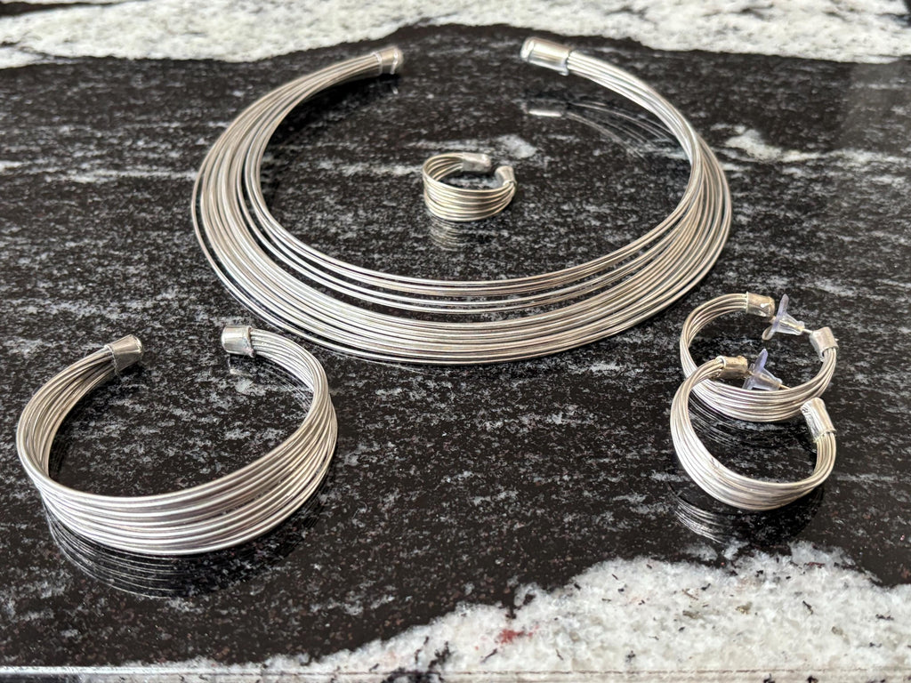 Four Piece Brass and Silver Statement Jewelry Set