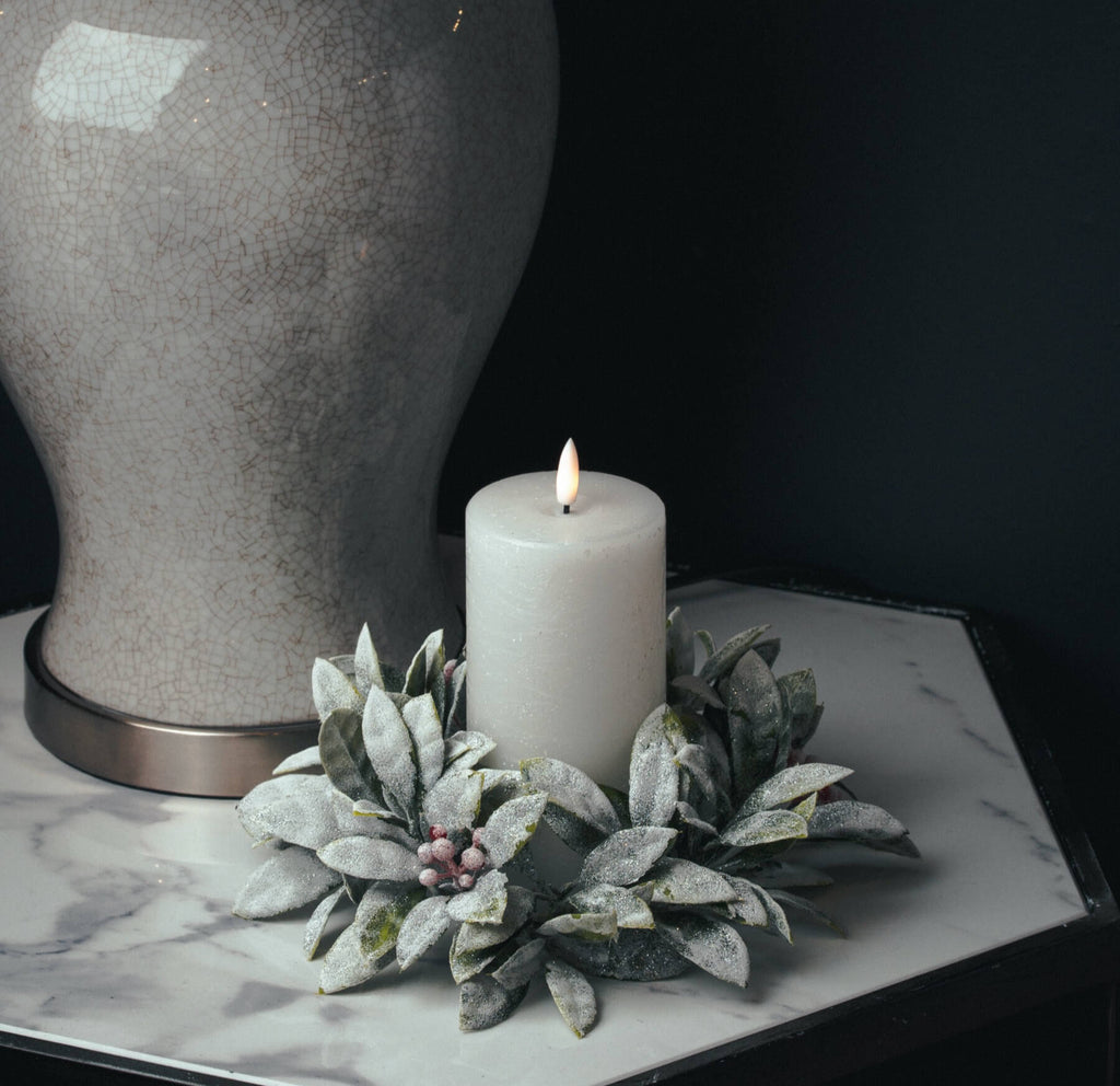 White LED pillar candle with realistic flicker, wax-like finish, and timer function for safe, flameless ambiance by RoomLondon at brixbailey.com