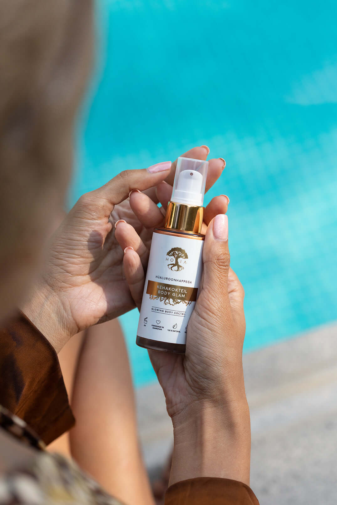 Embrace Radiance with Body Glam Hydrating Body Cocktail - Ultimate Skincare Shine & Glow by HOIA at www.brixbailey.com