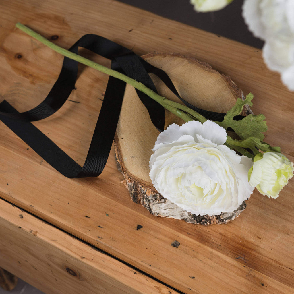 White artificial ranunculus spray with lifelike petals, 27-inch stem, perfect for home decor. by sostter at brixbailey.com