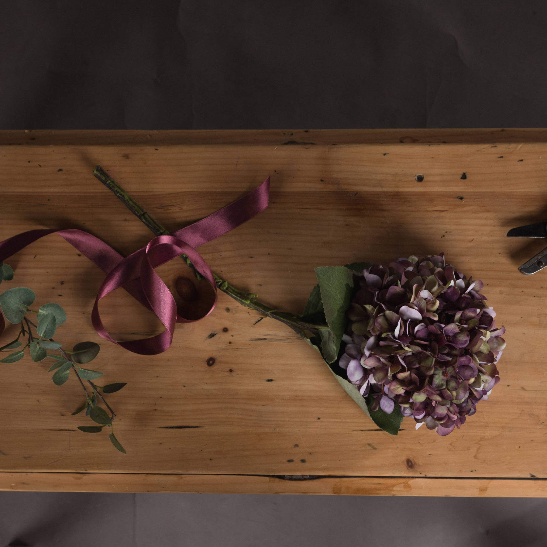 Luxury artificial hydrangea stem with purple, burgundy, and green hyper-realistic blooms, 42cm height by sostter at brixbailey.com