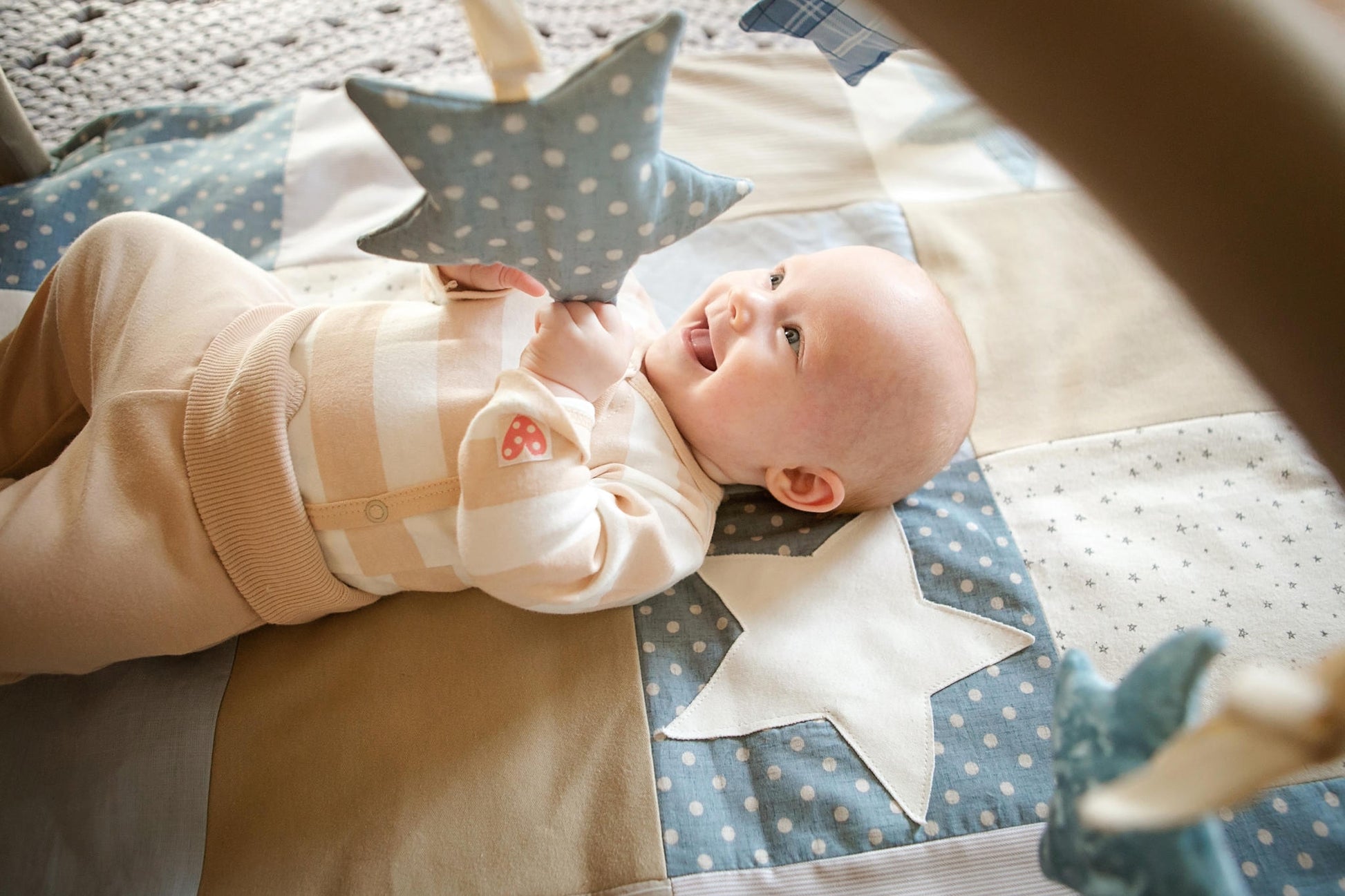 Karloova Handmade Activity Blanket – Stimulate Baby’s Development by Karloova at www.brixbailey.com