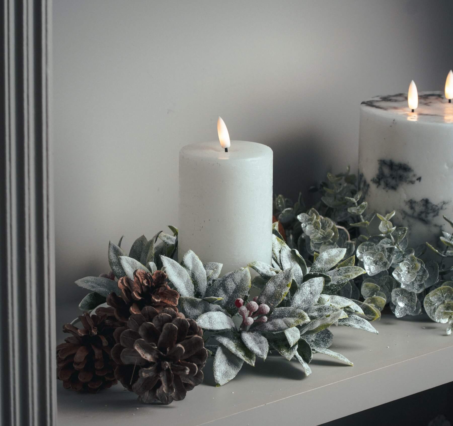 White LED pillar candle with realistic flicker, safe flameless design, and wax-like finish for home decor ambiance. by RoomLondon at brixbailey.com