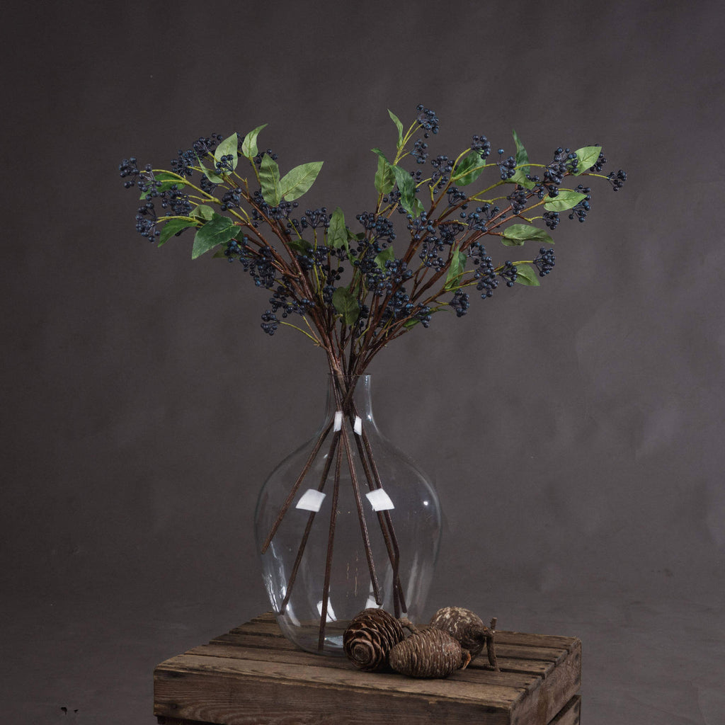 Handcrafted indigo berry stems with deep blue hues, flexible wired branches, and realistic texture for floral arrangements. by sostter at brixbailey.com