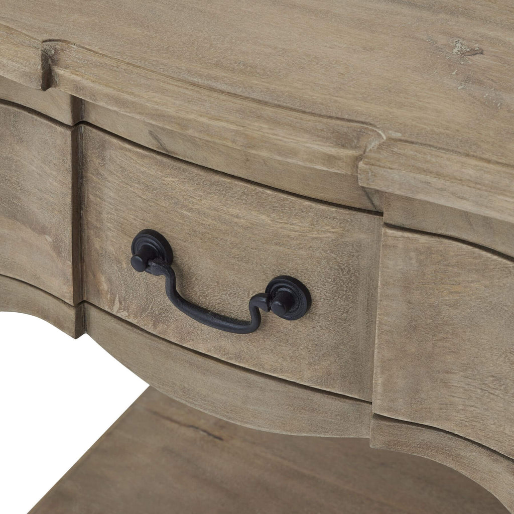 Handcrafted French provincial side table with hardwood construction, bleached finish, and black iron handles. by RoomLondon at brixbailey.com