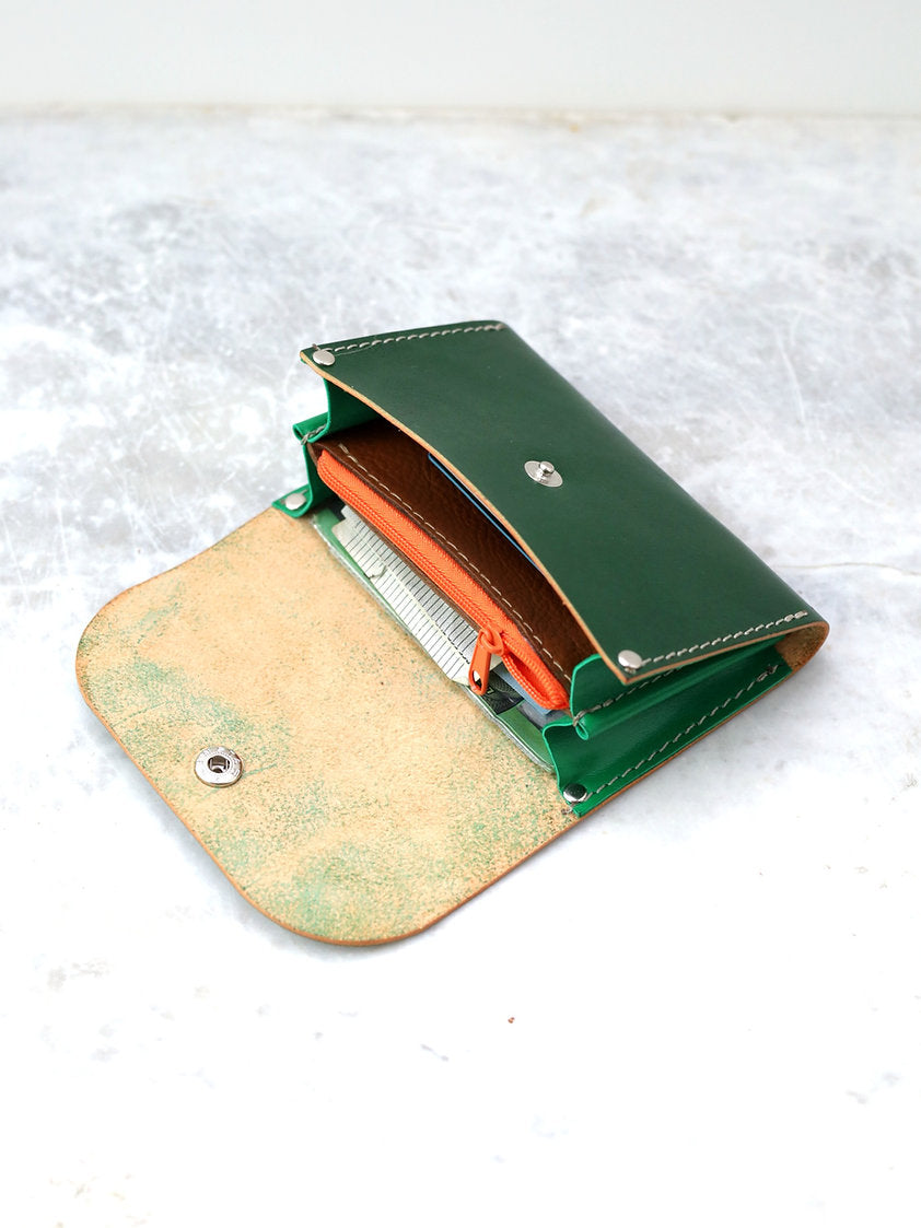 Vibrant Green Leather Wallet – Spacious & Secure Coin Pocket by TOKS VISOKS at www.brixbailey.com