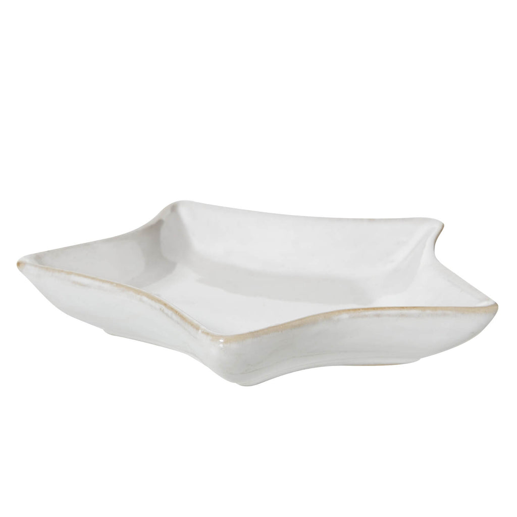 White ceramic star dish with clean lines, minimalist design, and smooth glaze finish for home dÃ©cor by sostter at brixbailey.com