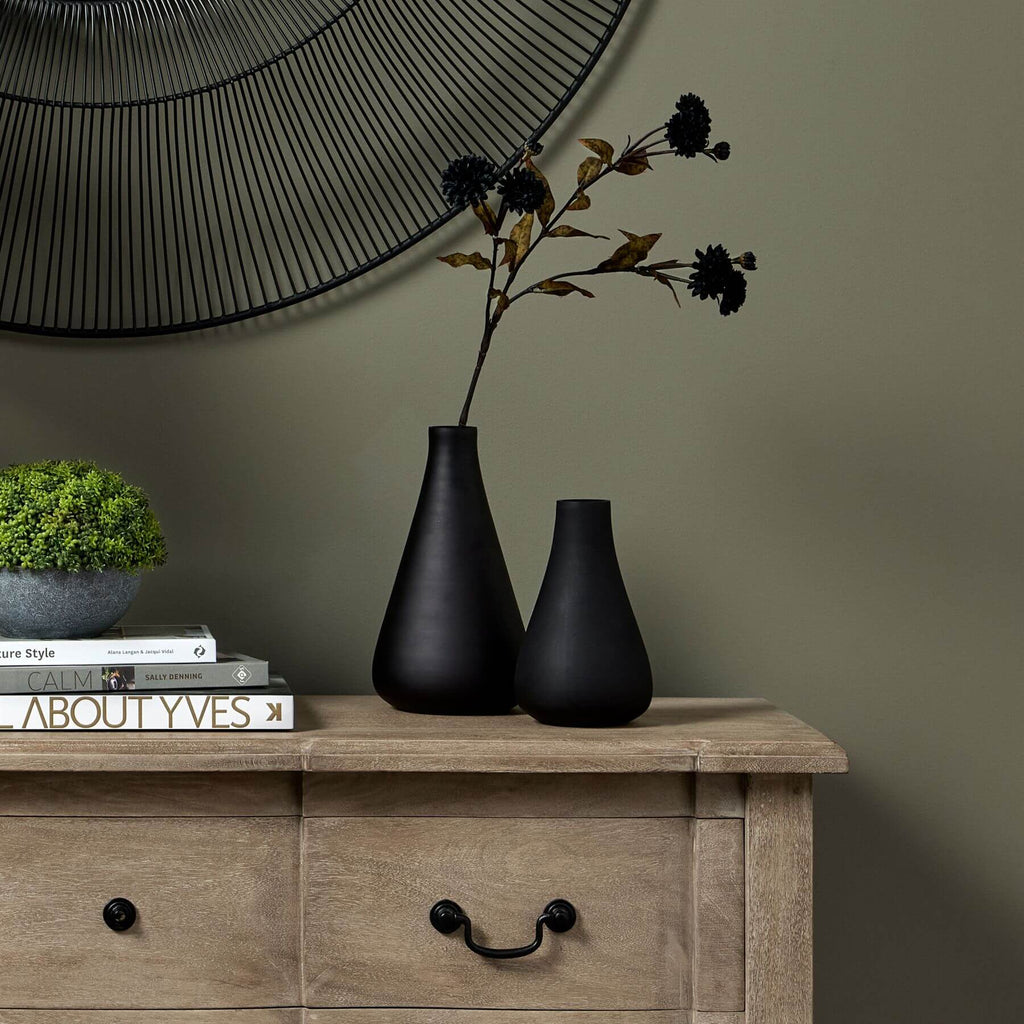 Slender matte black glass vase, hand-blown artisan decor for modern floral arrangements or standalone display. by Sostter at brixbailey.com