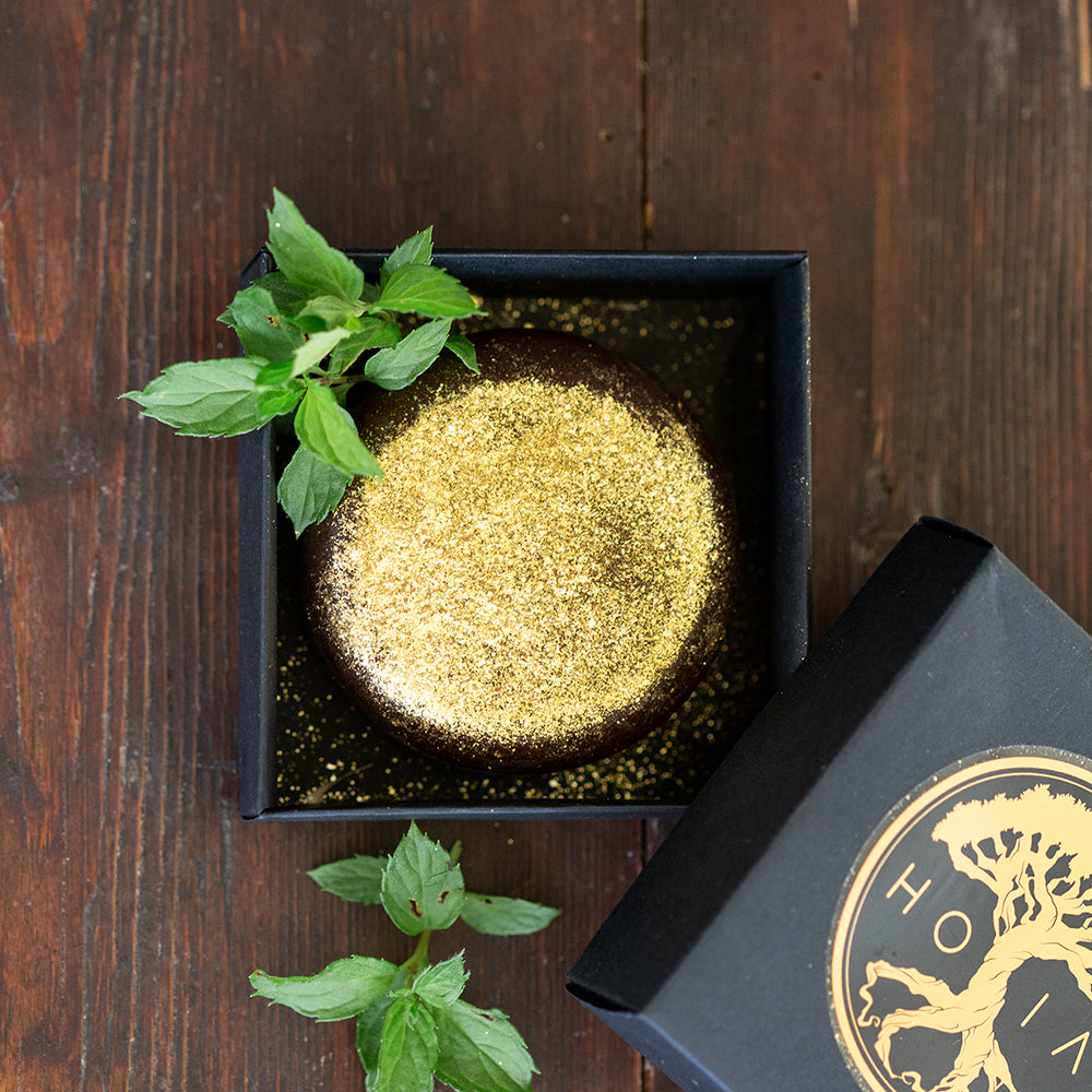 Nourish Your Skin with Shimmering Body Chocolate - Luxurious & Eco-Friendly Skincare by HOIA at www.brixbailey.com