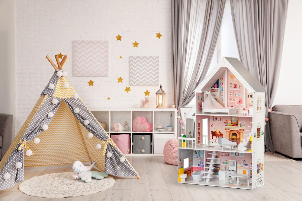 elegant wooden dollhouse liselle with warm led lights illuminating the furnished rooms at dusk