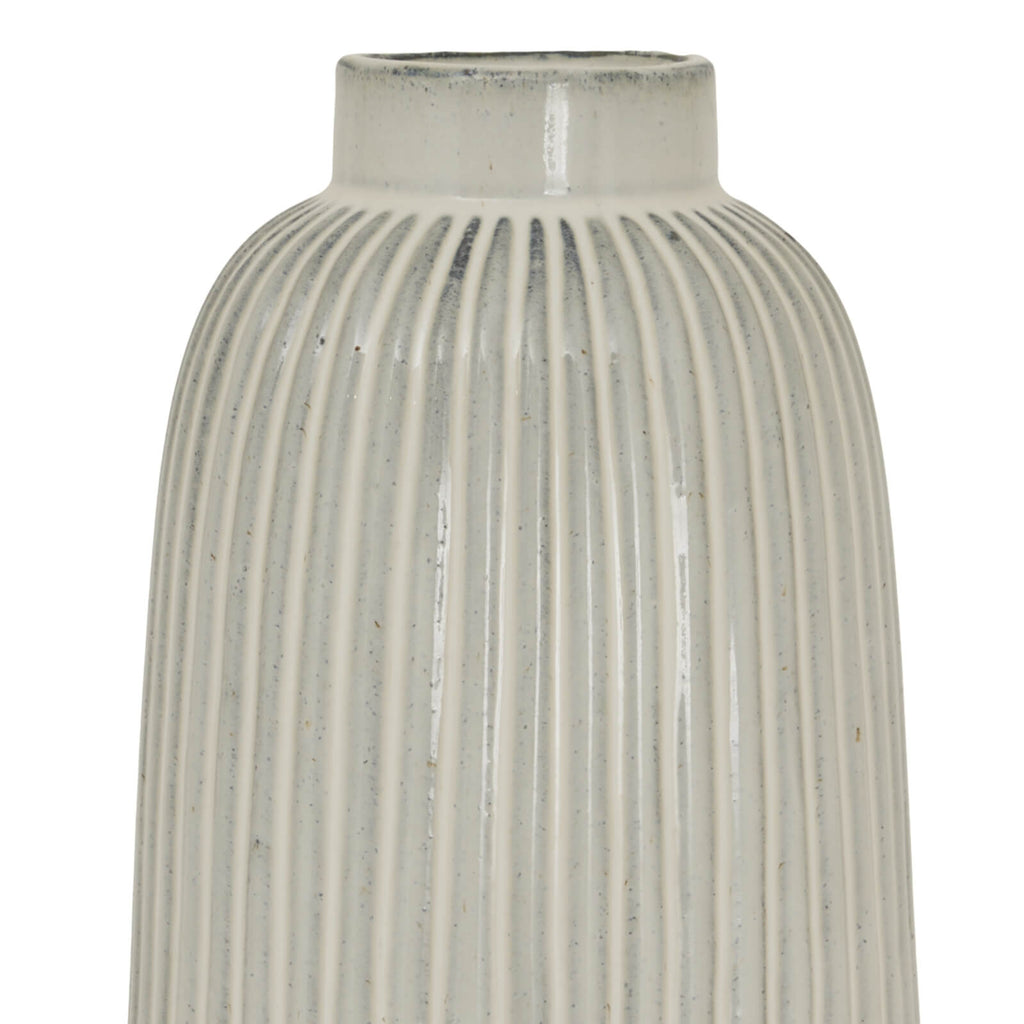 Hand-blown Monte bell-shaped vase in pure white ceramic, reflecting light with minimalist organic curves. by sostter at brixbailey.com