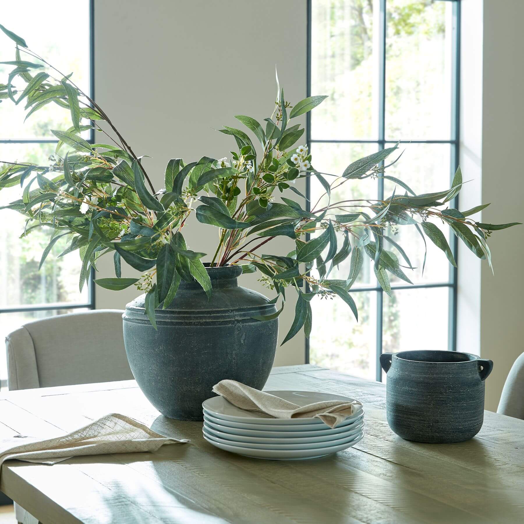 Handcrafted grey ceramic Amalfi Hydria pot with weathered finish, 15cm height, Mediterranean-inspired design. by Sostter at brixbailey.com