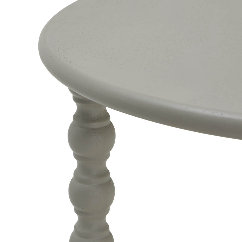 Grey circular wood accent table with modern design, perfect for living rooms or bedrooms. by Sostter at brixbailey.com