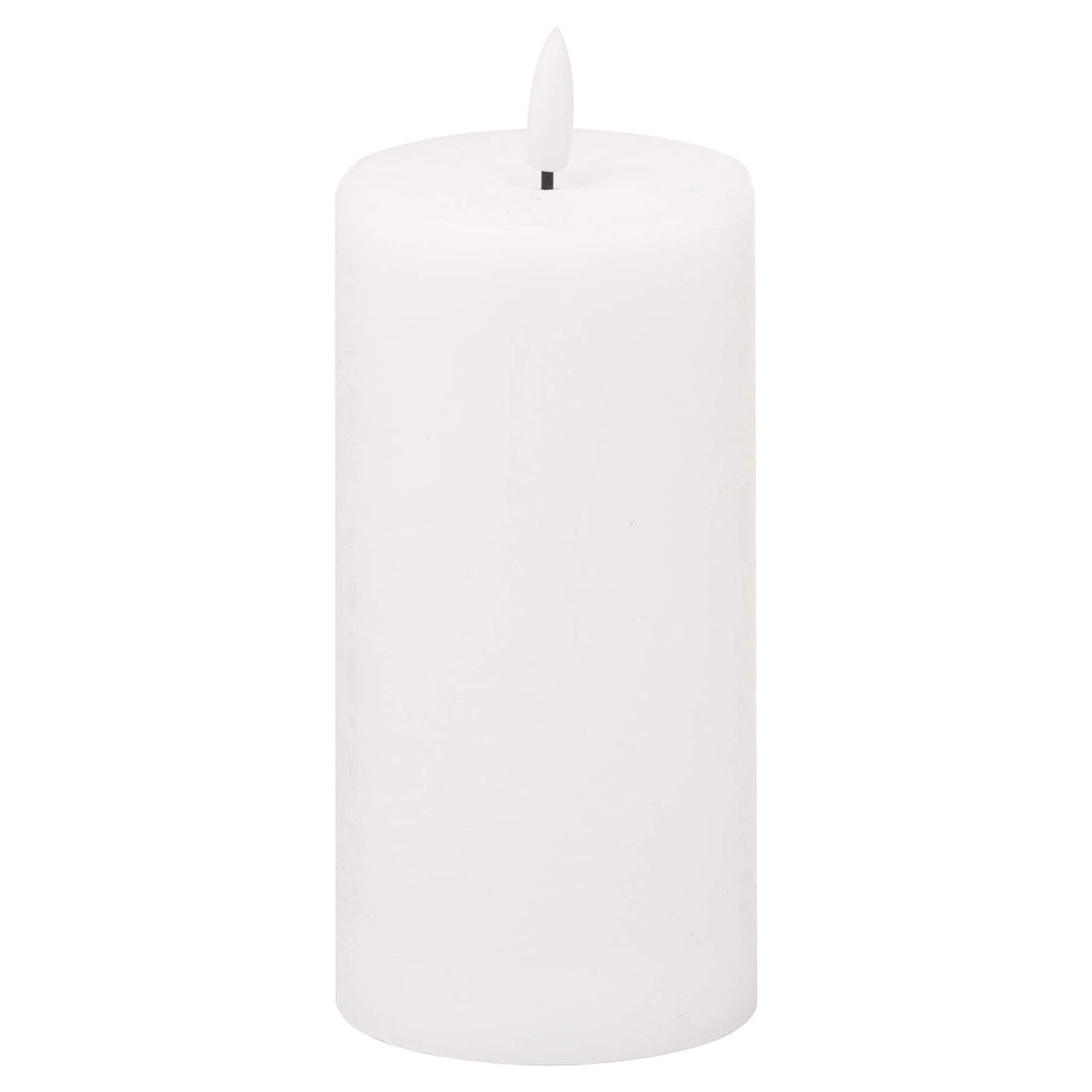 White LED pillar candle with realistic flickering amber glow, safe flameless design, 15cm height, plastic wax-like finish by RoomLondon at brixbailey.com