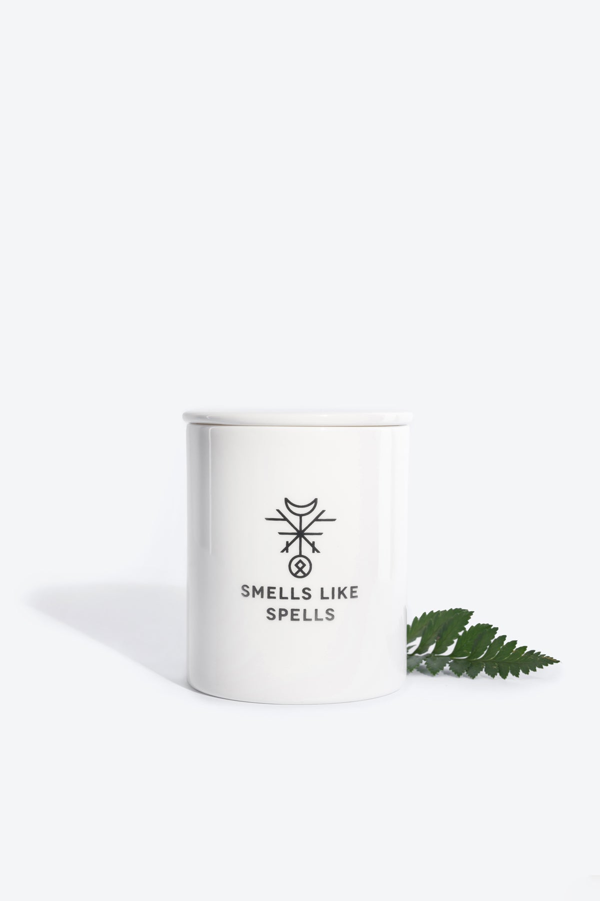 bold strength tarot candle glowing with confidence in a dramatic close-up shot