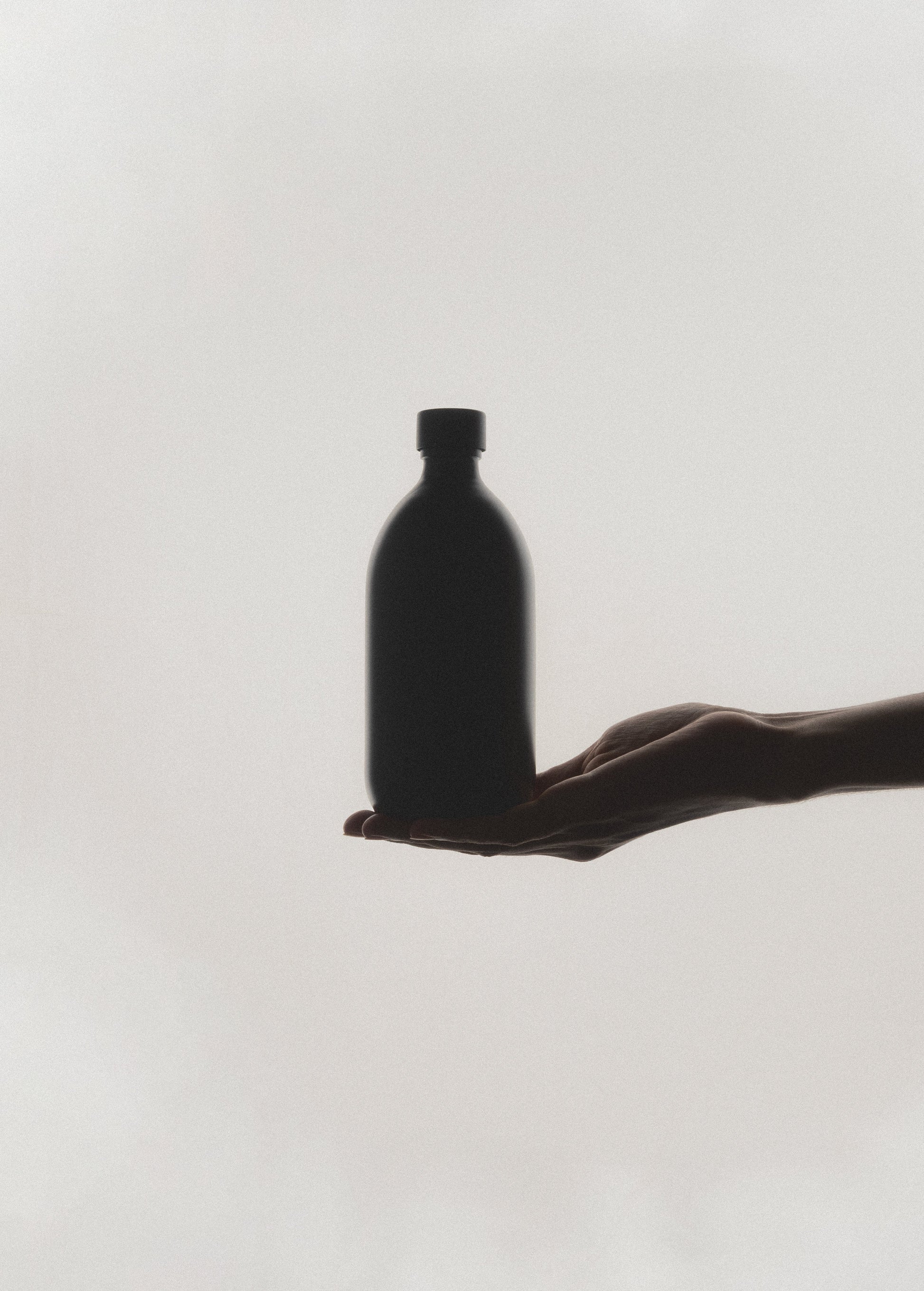 Black Glass Storage Bottle with Stainless Steel Cap