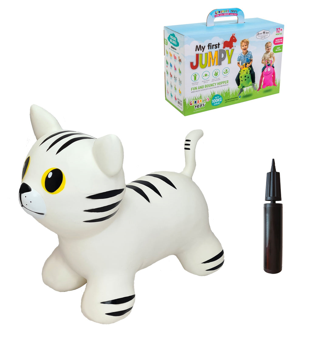 a soft white cat hopper toy sitting in a cozy nursery, ready for a toddler's first bounce