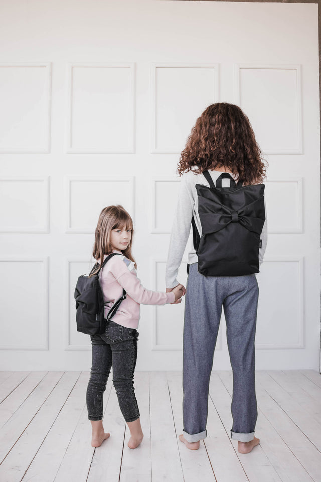 Black Bow Backpack – Stylish, Waterproof & Multi-Pocket by Muni at www.brixbailey.com