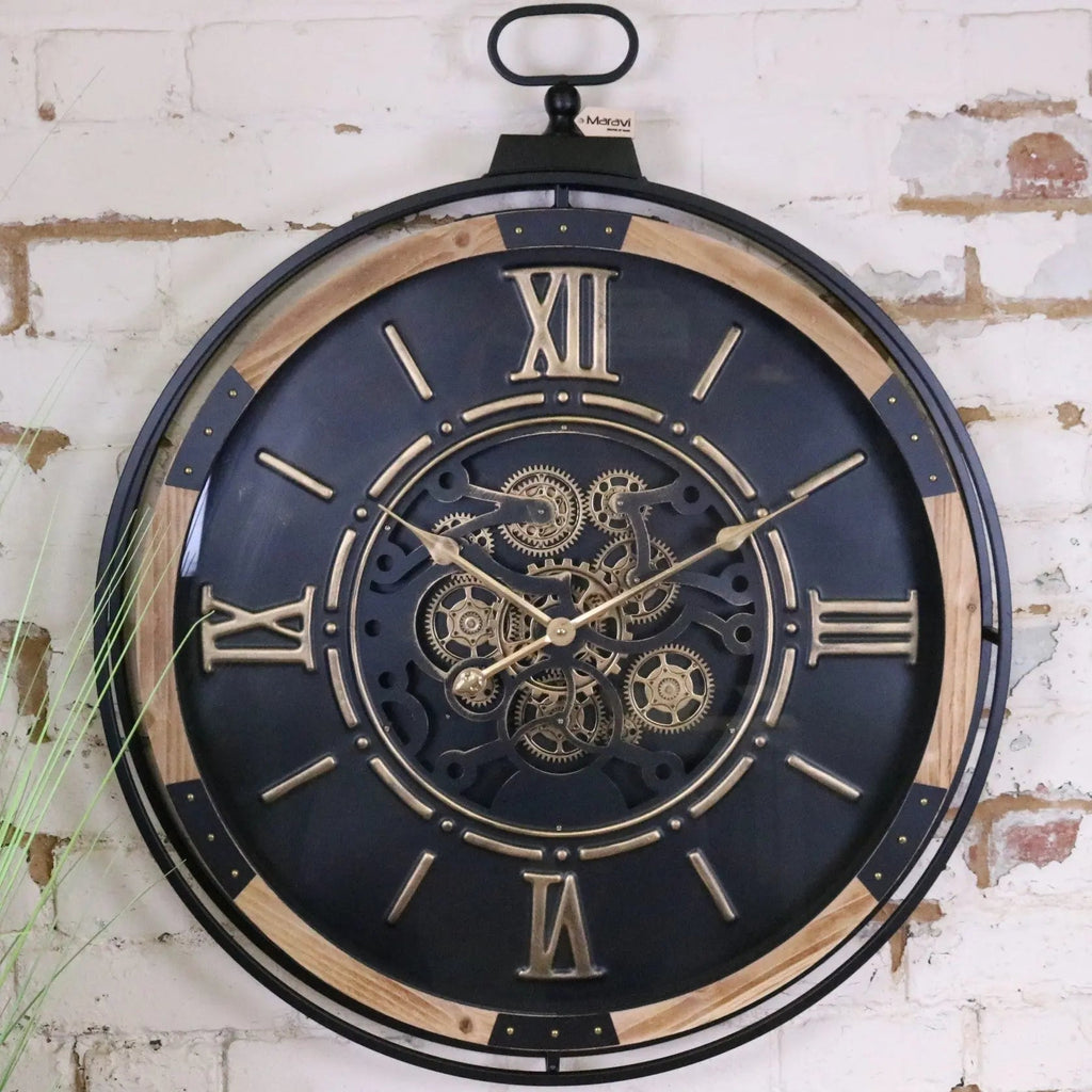 Decorative wall clock with mechanical design on a brick wall background at Sostter