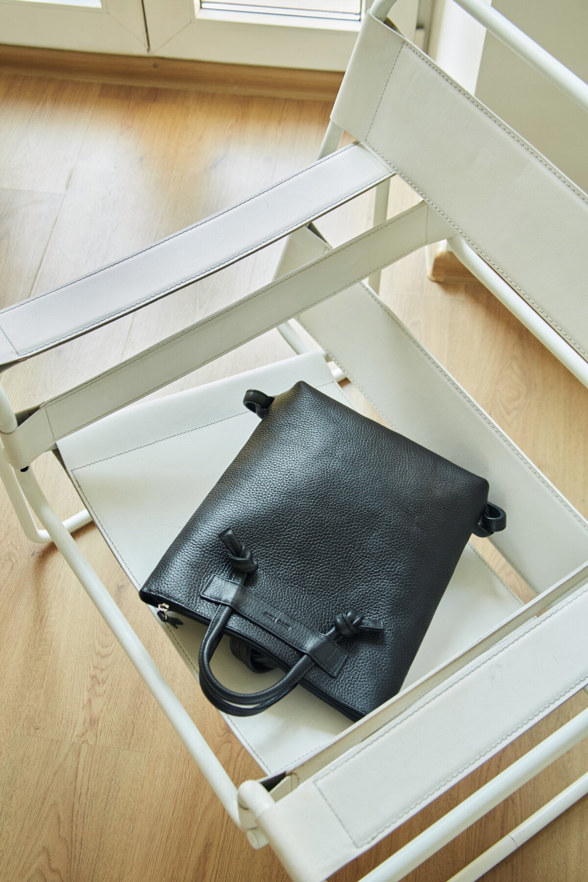 Minimal Leather Backpack with Knotted Detailing