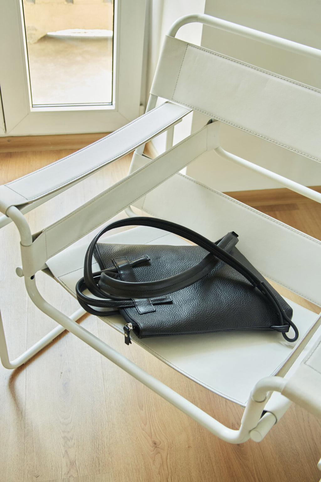 Minimal Leather Backpack with Knotted Detailing