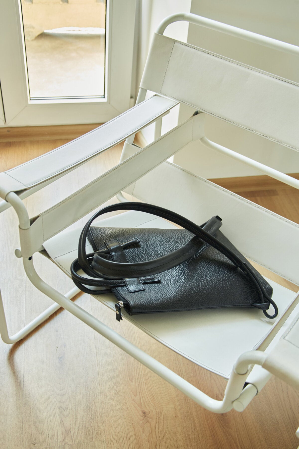 Minimal Leather Backpack with Knotted Detailing