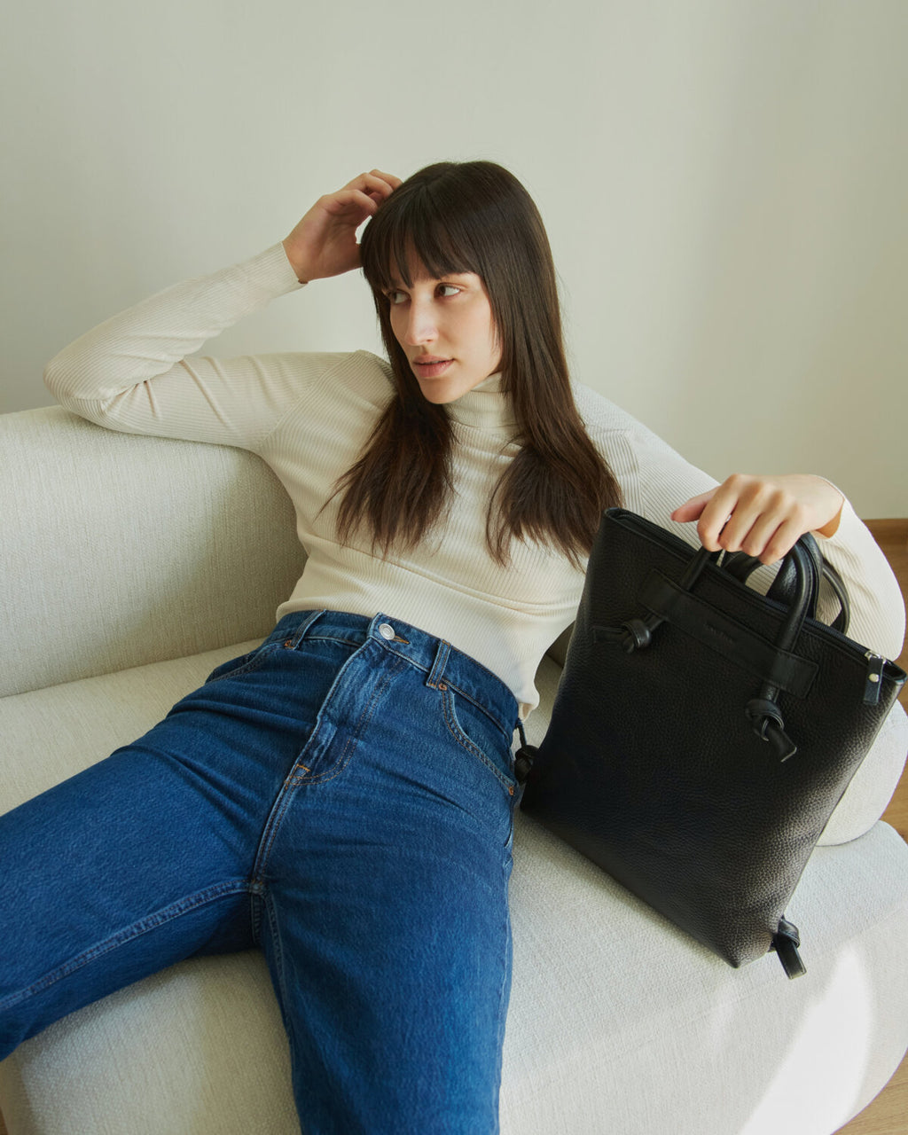Minimal Leather Backpack with Knotted Detailing