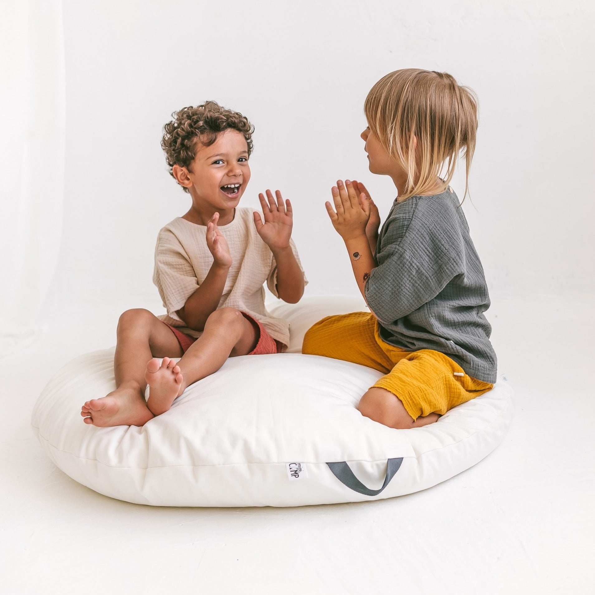 Lounger Floor Pillow with Handle in Milk Canvas