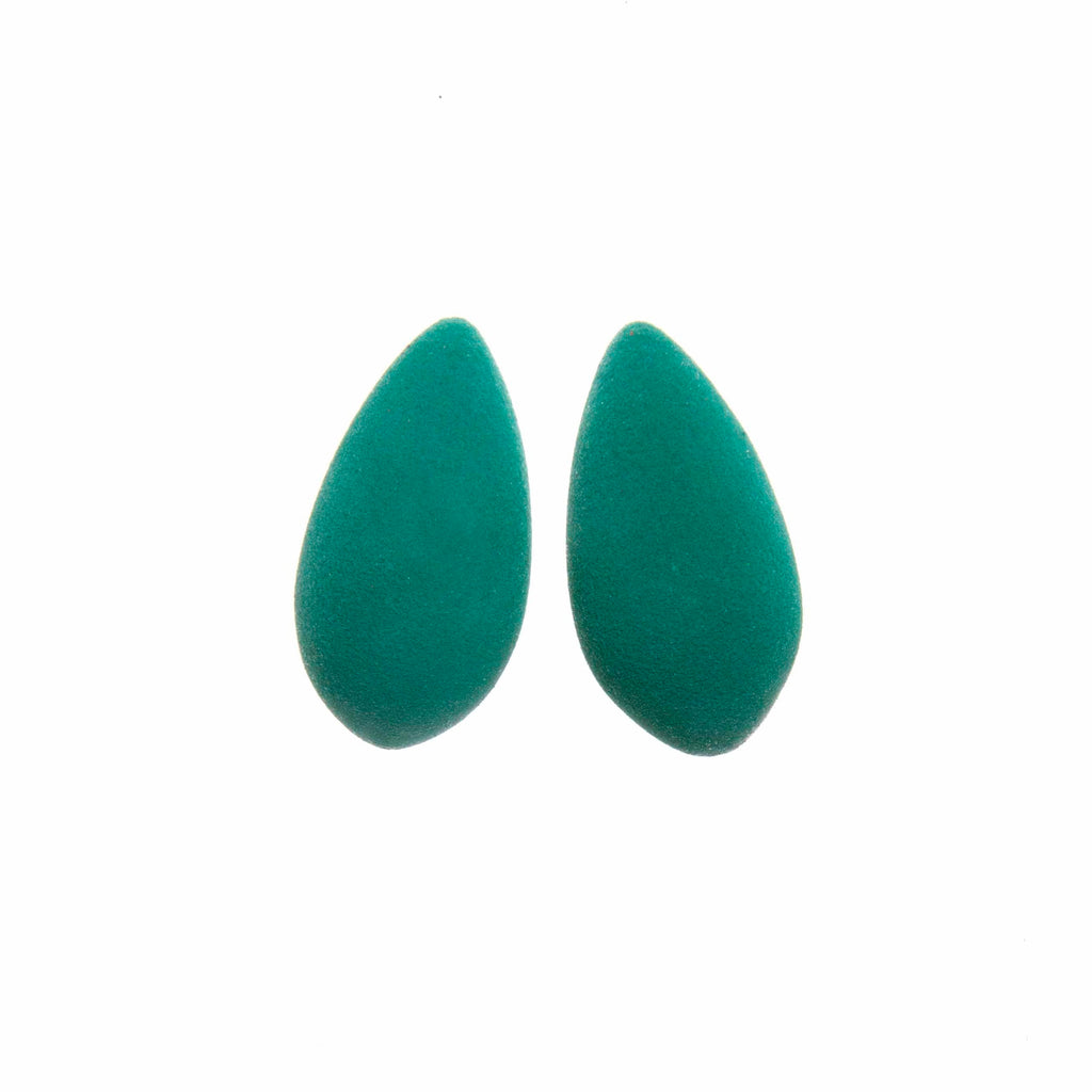 softly lit featherlight mango earrings with a velvety cosmic dust glow