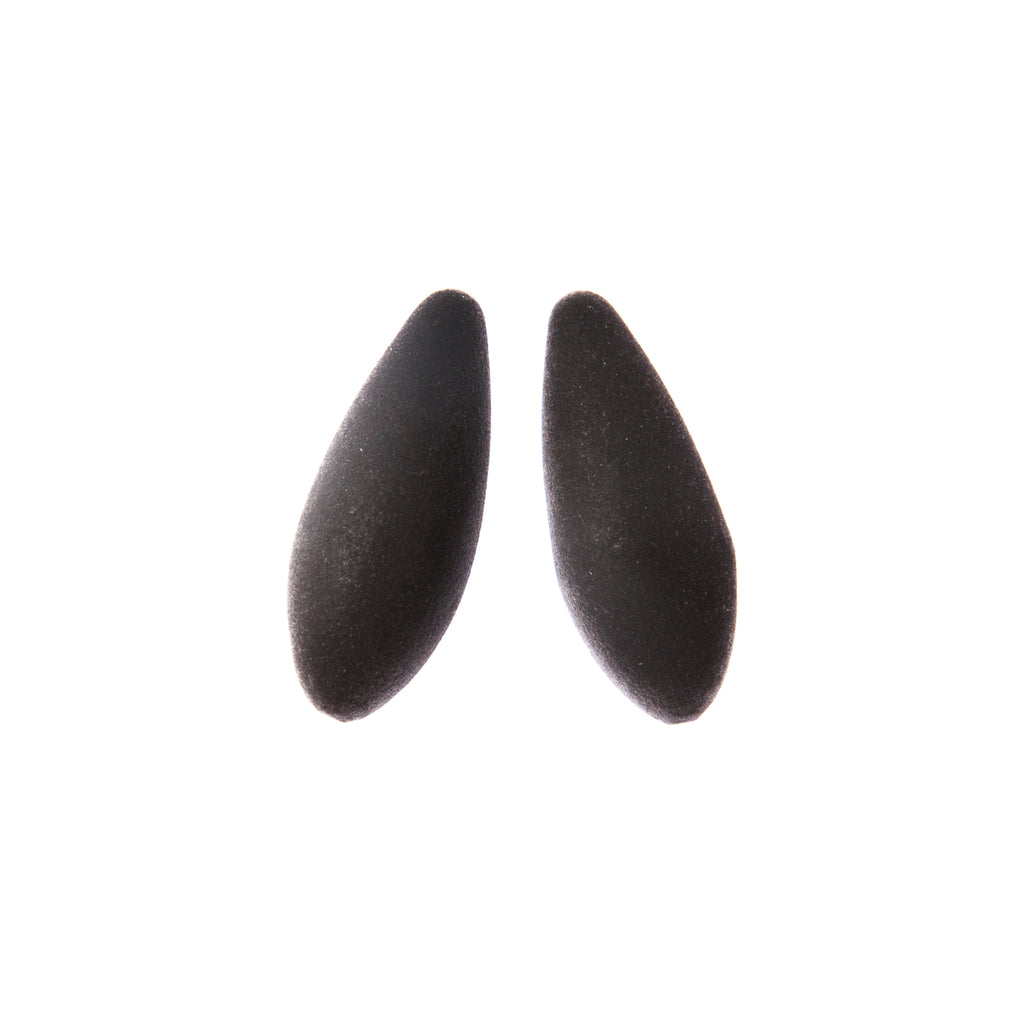 softly lit mini blackcurrant earrings with a velvety cosmic dust glow, resting on a gentle surface