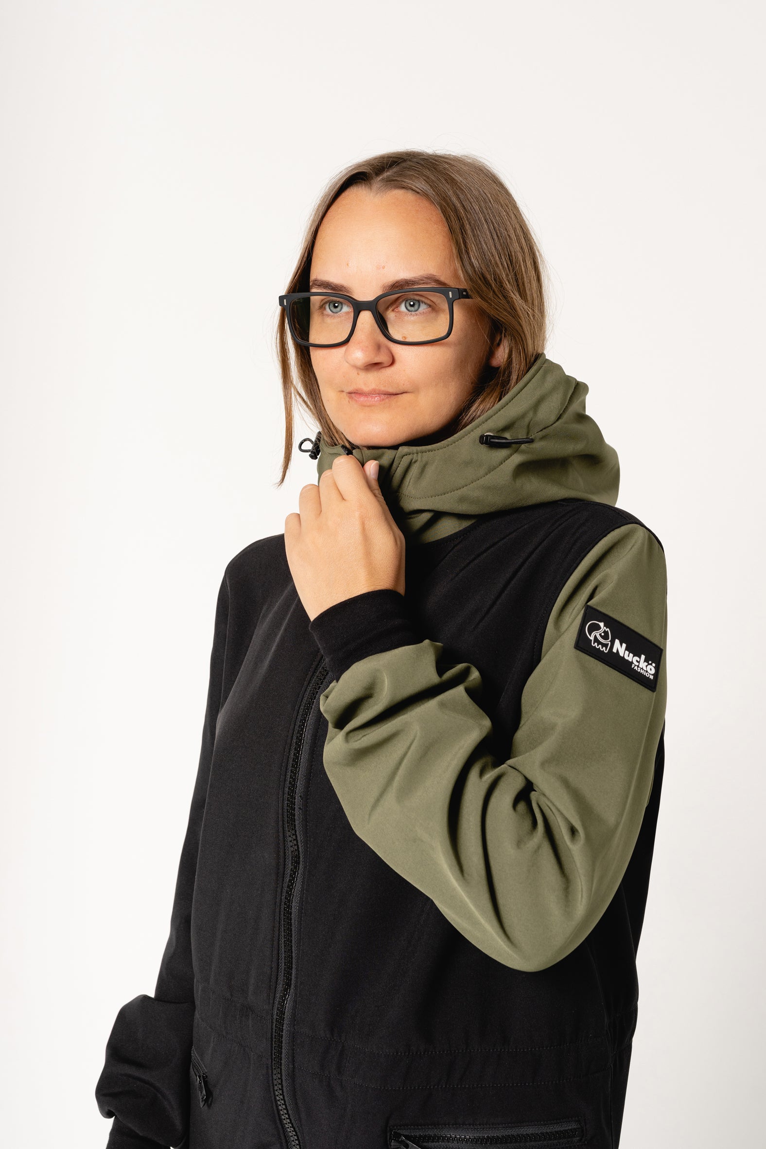 elegant carola softshell overall in a refined setting, highlighting its estonian craftsmanship and sustainable design