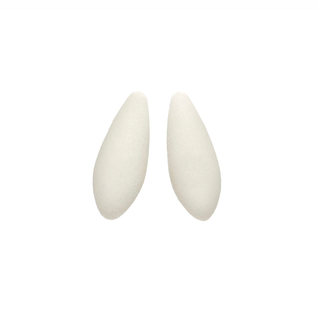 softly lit mini snowberries earrings with a velvety texture and cosmic dust glow, resting on a gentle surface