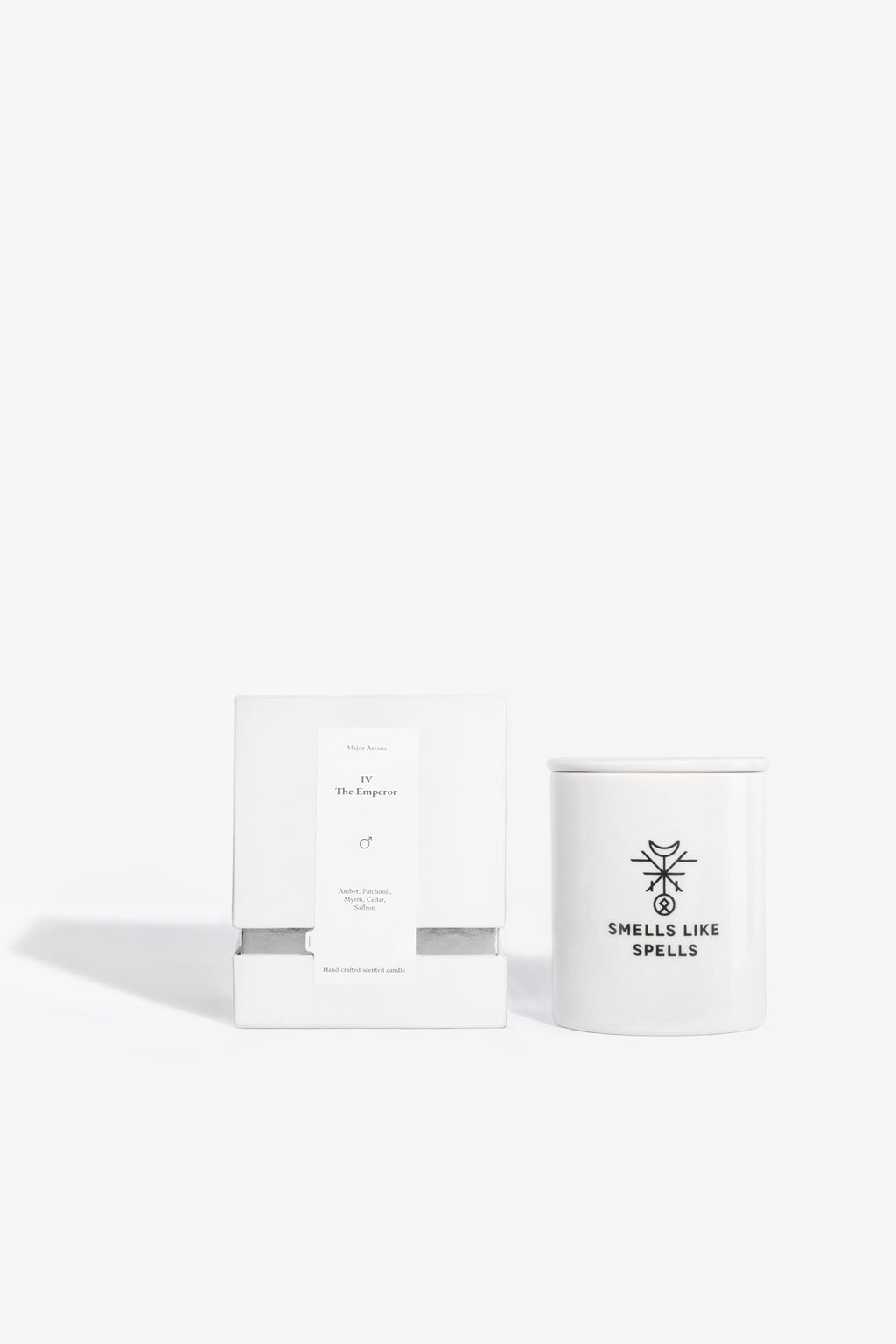the emperor tarot candle glowing boldly with a rich cedar and saffron scent for masculine energy