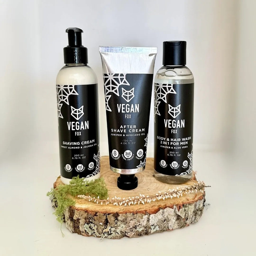 soft-lit men's grooming set with shaving cream and after shave on a cozy wooden surface