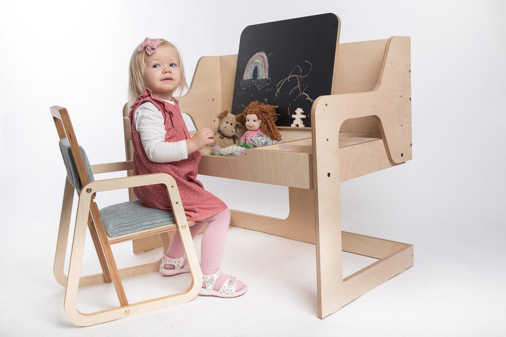 playful mint green julle kids chair with plush padding in a bright, sunlit playroom